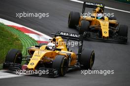 Kevin Magnussen (DEN) Renault Sport F1 Team RS16 leads team mate Jolyon Palmer (GBR) Renault Sport F1 Team RS16. 03.07.2016. Formula 1 World Championship, Rd 9, Austrian Grand Prix, Spielberg, Austria, Race Day.