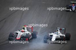 (L to R): Esteban Gutierrez (MEX) Haas F1 Team VF-16 and Felipe Massa (BRA) Williams FW38 at the start of the race. 03.07.2016. Formula 1 World Championship, Rd 9, Austrian Grand Prix, Spielberg, Austria, Race Day.
