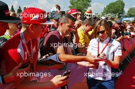 Claire Williams (GBR) Williams Deputy Team Principal signs autographs for the fans. 02.07.2016. Formula 1 World Championship, Rd 9, Austrian Grand Prix, Spielberg, Austria, Qualifying Day.