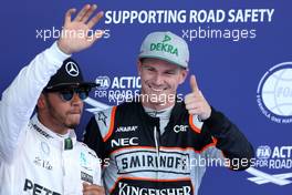Nico Hulkenberg (GER), Sahara Force India and Lewis Hamilton (GBR), Mercedes AMG F1 Team  02.07.2016. Formula 1 World Championship, Rd 9, Austrian Grand Prix, Spielberg, Austria, Qualifying Day.
