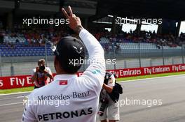 Lewis Hamilton (GBR) Mercedes AMG F1 celebrates his pole position. 02.07.2016. Formula 1 World Championship, Rd 9, Austrian Grand Prix, Spielberg, Austria, Qualifying Day.
