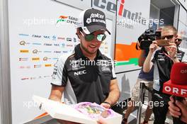 Sergio Perez (MEX) Sahara Force India F1 with the media. 30.06.2016. Formula 1 World Championship, Rd 9, Austrian Grand Prix, Spielberg, Austria, Preparation Day.