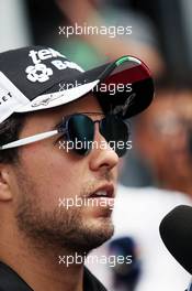 Sergio Perez (MEX) Sahara Force India F1 with the media. 30.06.2016. Formula 1 World Championship, Rd 9, Austrian Grand Prix, Spielberg, Austria, Preparation Day.