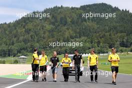 Kevin Magnussen (DEN), Renault Sport F1 Team and Esteban Ocon (FRA), Third Driver, Renault Sport F1 Team  30.06.2016. Formula 1 World Championship, Rd 9, Austrian Grand Prix, Spielberg, Austria, Preparation Day.