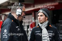 (L to R): Tom McCullough (GBR) Sahara Force India F1 Team Chief Engineer with Sergio Perez (MEX) Sahara Force India F1. 22.02.2016. Formula One Testing, Day One, Barcelona, Spain. Monday.