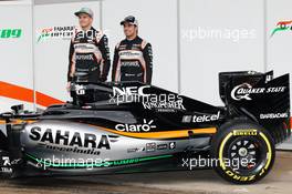 (L to R): Nico Hulkenberg (GER) Sahara Force India F1 and team mate Sergio Perez (MEX) Sahara Force India F1 with the Sahara Force India F1 VJM09. 22.02.2016. Formula One Testing, Day One, Barcelona, Spain. Monday.