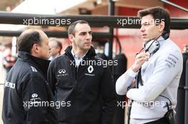 (L to R): Frederic Vasseur (FRA) Renault Sport F1 Team Racing Director with Cyril Abiteboul (FRA) Renault Sport F1 Managing Director and Toto Wolff (GER) Mercedes AMG F1 Shareholder and Executive Director. 22.02.2016. Formula One Testing, Day One, Barcelona, Spain. Monday.