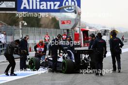 Carlos Sainz Jr (ESP) Scuderia Toro Rosso STR11 in the pits. 22.02.2016. Formula One Testing, Day One, Barcelona, Spain. Monday.
