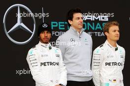 (L to R): Lewis Hamilton (GBR) Mercedes AMG F1 with Toto Wolff (GER) Mercedes AMG F1 Shareholder and Executive Director and Nico Rosberg (GER) Mercedes AMG F1. 22.02.2016. Formula One Testing, Day One, Barcelona, Spain. Monday.
