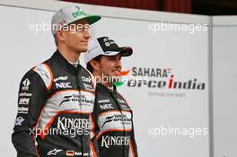 (L to R): Nico Hulkenberg (GER) Sahara Force India F1 with Sergio Perez (MEX) Sahara Force India F1. 22.02.2016. Formula One Testing, Day One, Barcelona, Spain. Monday.