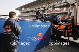 The Scuderia Toro Rosso STR11 of Max Verstappen (NLD) Scuderia Toro Rosso is recovered back to the pits on the back of a truck. 23.02.2016. Formula One Testing, Day Two, Barcelona, Spain. Tuesday.