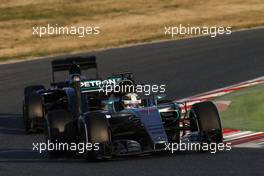 Lewis Hamilton (GBR) Mercedes AMG F1 W07 Hybrid leads Carlos Sainz Jr (ESP) Scuderia Toro Rosso STR11. 24.02.2016. Formula One Testing, Day Three, Barcelona, Spain. Wednesday.