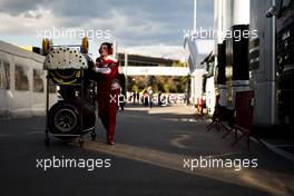 Ferrari mechanic with Pirelli tyres in the paddock. 03.03.2016. Formula One Testing, Day Three, Barcelona, Spain. Thursday.
