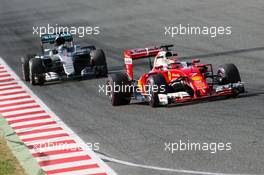 Kimi Raikkonen (FIN) Ferrari SF16-H leads Nico Rosberg (GER) Mercedes AMG F1 W07 Hybrid. 03.03.2016. Formula One Testing, Day Three, Barcelona, Spain. Thursday.