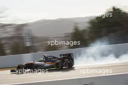 Nico Hulkenberg (GER) Sahara Force India F1 VJM09 locks up under braking. 03.03.2016. Formula One Testing, Day Three, Barcelona, Spain. Thursday.