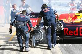 Daniil Kvyat (RUS) Red Bull Racing RB12 with smoke at the rear wheel. 01.03.2016. Formula One Testing, Day One, Barcelona, Spain. Tuesday.