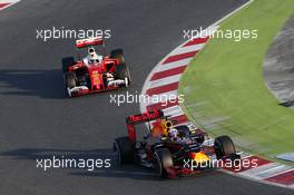 Daniel Ricciardo (AUS) Red Bull Racing RB12 leads Sebastian Vettel (GER) Ferrari SF16-H. 02.03.2016. Formula One Testing, Day Two, Barcelona, Spain. Wednesday.