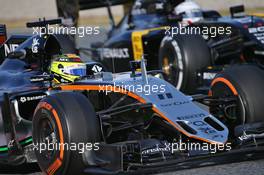 Sergio Perez (MEX) Sahara Force India F1 VJM09 and Kevin Magnussen (DEN) Renault Sport F1 Team RS16. 02.03.2016. Formula One Testing, Day Two, Barcelona, Spain. Wednesday.