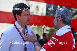 (L to R): Toto Wolff (GER) Mercedes AMG F1 Shareholder and Executive Director with Maurizio Arrivabene (ITA) Ferrari Team Principal. 26.08.2016. Formula 1 World Championship, Rd 13, Belgian Grand Prix, Spa Francorchamps, Belgium, Practice Day.