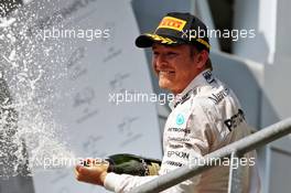 Race winner Nico Rosberg (GER) Mercedes AMG F1 celebrates with the champagne on the podium. 28.08.2016. Formula 1 World Championship, Rd 13, Belgian Grand Prix, Spa Francorchamps, Belgium, Race Day.