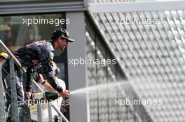 Daniel Ricciardo (AUS) Red Bull Racing celebrates his second position with the champagne on the podium. 28.08.2016. Formula 1 World Championship, Rd 13, Belgian Grand Prix, Spa Francorchamps, Belgium, Race Day.