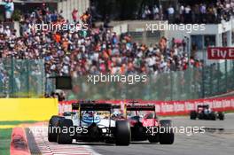 Valtteri Bottas (FIN) Williams FW38 and Sebastian Vettel (GER) Ferrari SF16-H. 28.08.2016. Formula 1 World Championship, Rd 13, Belgian Grand Prix, Spa Francorchamps, Belgium, Race Day.