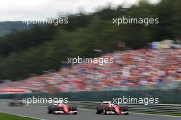 (L to R): Kimi Raikkonen (FIN) Ferrari SF16-H with team mate Sebastian Vettel (GER) Ferrari SF16-H. 28.08.2016. Formula 1 World Championship, Rd 13, Belgian Grand Prix, Spa Francorchamps, Belgium, Race Day.