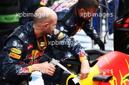 Red Bull Racing RB12 worked on by mechanics in the pits as the race is stopped. 28.08.2016. Formula 1 World Championship, Rd 13, Belgian Grand Prix, Spa Francorchamps, Belgium, Race Day.