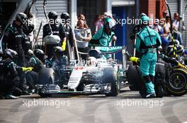 Lewis Hamilton (GBR) Mercedes AMG F1 W07 Hybrid makes a pit stop. 28.08.2016. Formula 1 World Championship, Rd 13, Belgian Grand Prix, Spa Francorchamps, Belgium, Race Day.