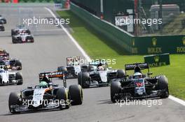 Nico Hulkenberg (GER) Sahara Force India F1 VJM09 and Fernando Alonso (ESP) McLaren MP4-31 battle for position. 28.08.2016. Formula 1 World Championship, Rd 13, Belgian Grand Prix, Spa Francorchamps, Belgium, Race Day.