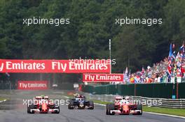 (L to R): Kimi Raikkonen (FIN) Ferrari SF16-H with team mate Sebastian Vettel (GER) Ferrari SF16-H. 28.08.2016. Formula 1 World Championship, Rd 13, Belgian Grand Prix, Spa Francorchamps, Belgium, Race Day.