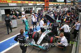 Nico Rosberg (GER) Mercedes AMG F1 W07 Hybrid in the pits as the race is stopped. 28.08.2016. Formula 1 World Championship, Rd 13, Belgian Grand Prix, Spa Francorchamps, Belgium, Race Day.