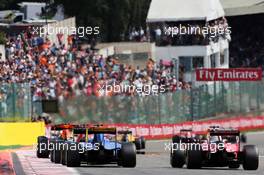 Felipe Nasr (BRA) Sauber C35 and Kimi Raikkonen (FIN) Ferrari SF16-H. 28.08.2016. Formula 1 World Championship, Rd 13, Belgian Grand Prix, Spa Francorchamps, Belgium, Race Day.