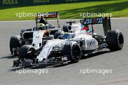 Felipe Massa (BRA) Williams FW38 and Sergio Perez (MEX) Sahara Force India F1 VJM09 battle for position. 28.08.2016. Formula 1 World Championship, Rd 13, Belgian Grand Prix, Spa Francorchamps, Belgium, Race Day.