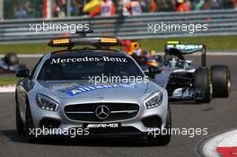 Nico Rosberg (GER) Mercedes AMG F1 W07 Hybrid leads behind the FIA Safety Car. 28.08.2016. Formula 1 World Championship, Rd 13, Belgian Grand Prix, Spa Francorchamps, Belgium, Race Day.