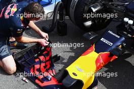 Red Bull Racing RB12 worked on by mechanics in the pits as the race is stopped. 28.08.2016. Formula 1 World Championship, Rd 13, Belgian Grand Prix, Spa Francorchamps, Belgium, Race Day.