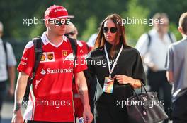 Kimi Raikkonen (FIN) Ferrari with his wife Minttu Raikkonen (FIN). 28.08.2016. Formula 1 World Championship, Rd 13, Belgian Grand Prix, Spa Francorchamps, Belgium, Race Day.