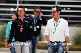 Rio Haryanto (IDN) Manor Racing with Piers Hunnisett (GBR) Driver Manager. 01.04.2016. Formula 1 World Championship, Rd 2, Bahrain Grand Prix, Sakhir, Bahrain, Practice Day