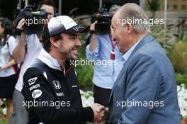 (L to R): Fernando Alonso (ESP) McLaren with Former Spanish King Juan Carlos. 01.04.2016. Formula 1 World Championship, Rd 2, Bahrain Grand Prix, Sakhir, Bahrain, Practice Day