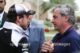 (L to R): Fernando Alonso (ESP) McLaren with Carlos Sainz (ESP). 01.04.2016. Formula 1 World Championship, Rd 2, Bahrain Grand Prix, Sakhir, Bahrain, Practice Day