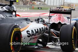 Max Verstappen (NLD) Scuderia Toro Rosso STR11 and Alfonso Celis Jr (MEX) Sahara Force India F1 VJM09 Development Driver at the pit lane exit. 01.04.2016. Formula 1 World Championship, Rd 2, Bahrain Grand Prix, Sakhir, Bahrain, Practice Day