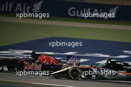 Max Verstappen (NLD) Scuderia Toro Rosso STR11 and Nico Hulkenberg (GER) Sahara Force India F1 VJM09. 03.04.2016. Formula 1 World Championship, Rd 2, Bahrain Grand Prix, Sakhir, Bahrain, Race Day.