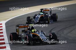 Sergio Perez (MEX) Sahara Force India F1 VJM09 leads team mate Nico Hulkenberg (GER) Sahara Force India F1 VJM09. 03.04.2016. Formula 1 World Championship, Rd 2, Bahrain Grand Prix, Sakhir, Bahrain, Race Day.