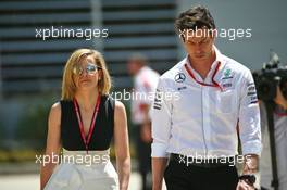 (L to R): Susie Wolff (GBR) with her husband Toto Wolff (GER) Mercedes AMG F1 Shareholder and Executive Director. 02.04.2016. Formula 1 World Championship, Rd 2, Bahrain Grand Prix, Sakhir, Bahrain, Qualifying Day.