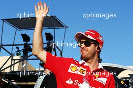 Sebastian Vettel (GER) Ferrari on the drivers parade. 03.04.2016. Formula 1 World Championship, Rd 2, Bahrain Grand Prix, Sakhir, Bahrain, Race Day.