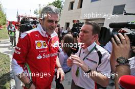 (L to R): Maurizio Arrivabene (ITA) Ferrari Team Principal with Craig Slater (GBR) Sky F1 Reporter. 03.04.2016. Formula 1 World Championship, Rd 2, Bahrain Grand Prix, Sakhir, Bahrain, Race Day.