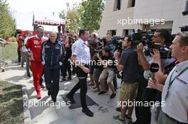 (L to R): Maurizio Arrivabene (ITA) Ferrari Team Principal, Franz Tost (AUT) Scuderia Toro Rosso Team Principal, and Eric Boullier (FRA) McLaren Racing Director leave a meeting. 03.04.2016. Formula 1 World Championship, Rd 2, Bahrain Grand Prix, Sakhir, Bahrain, Race Day.