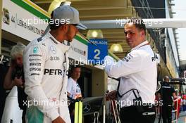 (L to R): Lewis Hamilton (GBR) Mercedes AMG F1 with Ron Meadows (GBR) Mercedes GP Team Manager. 11.11.2016. Formula 1 World Championship, Rd 20, Brazilian Grand Prix, Sao Paulo, Brazil, Practice Day.
