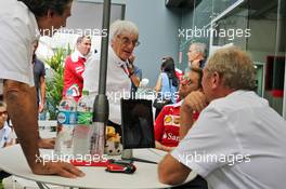 Bernie Ecclestone (GBR) with Sebastian Vettel (GER) Ferrari. 11.11.2016. Formula 1 World Championship, Rd 20, Brazilian Grand Prix, Sao Paulo, Brazil, Practice Day.