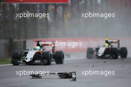 Nico Hulkenberg (GER) Sahara Force India F1 VJM09 and Sergio Perez (MEX) Sahara Force India F1 VJM09 pass debris from the Sauber C35 of Marcus Ericsson (SWE) Sauber F1 Team. 13.11.2016. Formula 1 World Championship, Rd 20, Brazilian Grand Prix, Sao Paulo, Brazil, Race Day.